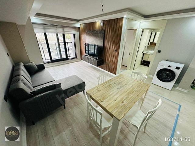 OLGUNLAR CADDESİNDE YENİ BİNA KAPALI OTOPARKLI EŞYALI KİRALIK 1+1 DAİRE