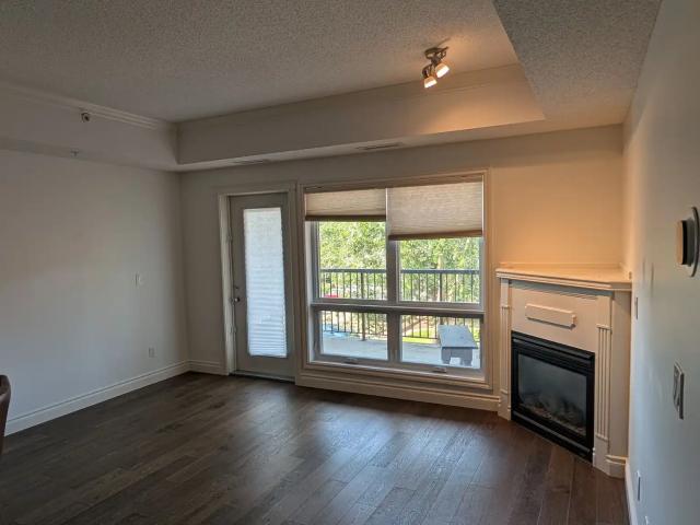 One Bedroom Plus Den in a Quiet Concrete Building