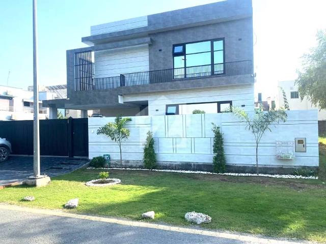 One Kanal 6 Month Used Luxury Ultra Modern Design Most Beautiful Full Furnished 15KV Solar Attached Bungalow For Sale At Prime Location Of DHA Lahore Near To Park Masjid & Commercial Market