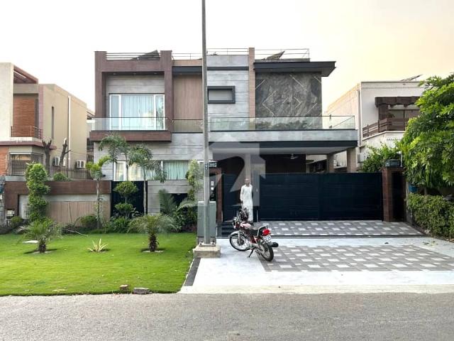 One Kanal Brand New Luxury Ultra Modern Design Most Beautiful Fully Furnished Bungalow 15KV Solar Installed 2 Servant Quarter In Basement For Sale At Prime Location Of DHA Lahore Near To Park Masjid & Commercial Market