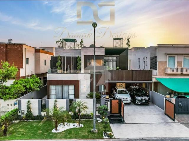 One Kanal Brand New Luxury Ultra Modern Design Most Beautiful Fully Furnished Rooftop Garden Bungalow 2 Servant Quarter In Basement For Sale At Prime Location Of DHA Lahore