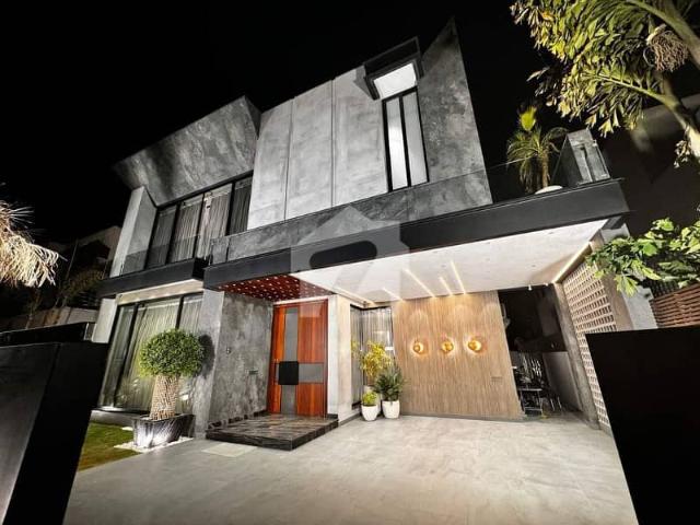 One Kanal Brand New Luxury Ultra Modern Design Most Beautiful Full Basement Fully Furnished Home Theater Swimming Pool Bungalow For Sale At Prime Of DHA Lahore Near to Park Masjid & Commercial Market