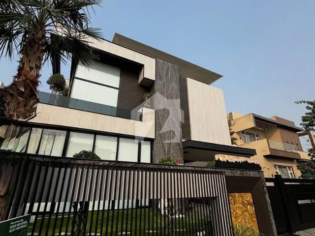 One Kanal Brand New Luxury Ultra Modern Design Most Beautiful Full Basement Fully Furnished Home Theater Swimming Pool Lift Bungalow For Sale At Prime Location Of DHA Lahore Near To Park Masjid & Defence Raya Fairways Commercial