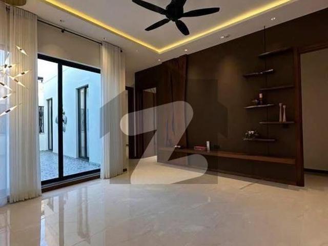 One Kanal Luxurious Semi Furnish Bungalow With Ac And Cartains Located Near Dolmen Mall DHA Phase 6
