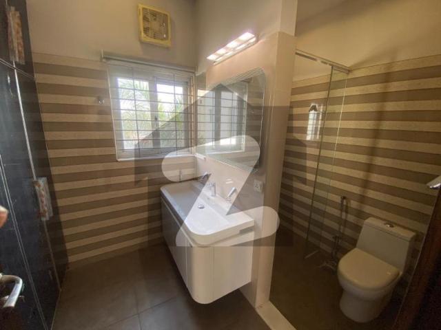 One kanal semi furnished house with basement at central location available for rent dha phase 6 block k