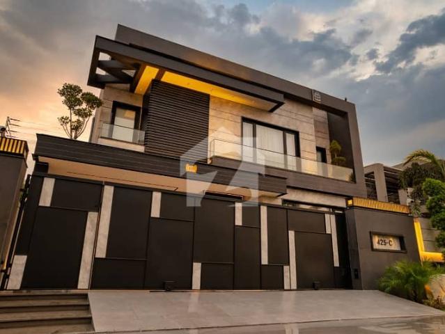 One Kanal Unique And Splendid Villa Fully Furnished, Ready To Move In Block C Of Phase 6. Prime Location