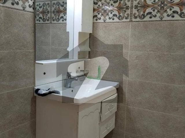 One Kanal upper portion 2 bed with bath TVL kitchen car parking