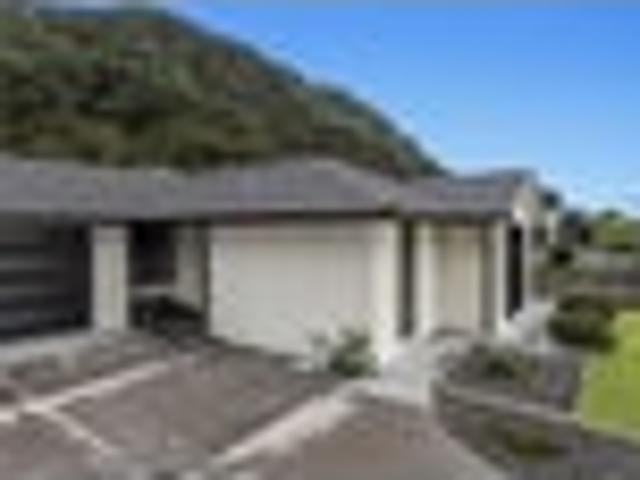 One Title, Two Dwellings: A Rare Opportunity