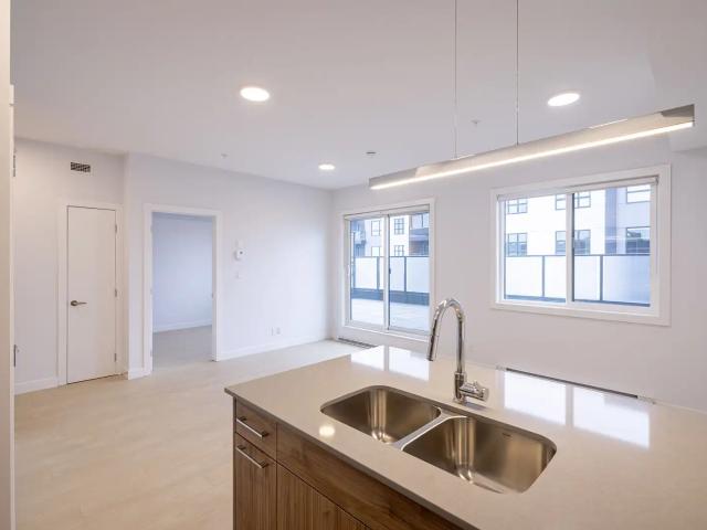 Top Floor Living + Utilities Included + 1st Month Free