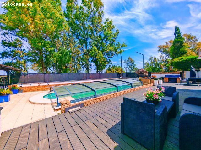 Oportunidad única: chalet con piscina climatizada, sala de juegos y habitación independiente para in