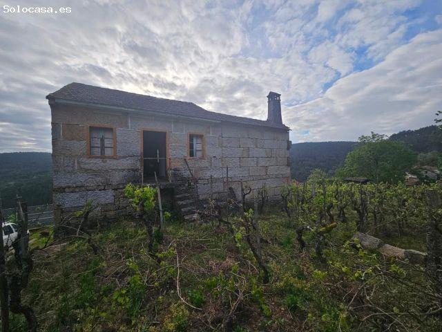 ¡OPORTUNIDAD ÚNICA EN TOÉN! CASA CON GRAN TERRENO Y VISTAS ESPECTACULARES