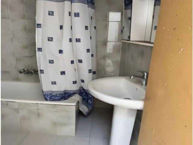 Oportunidad de Inversión: Casa con Patio y 4 Dormitorios en Centro de Montijo