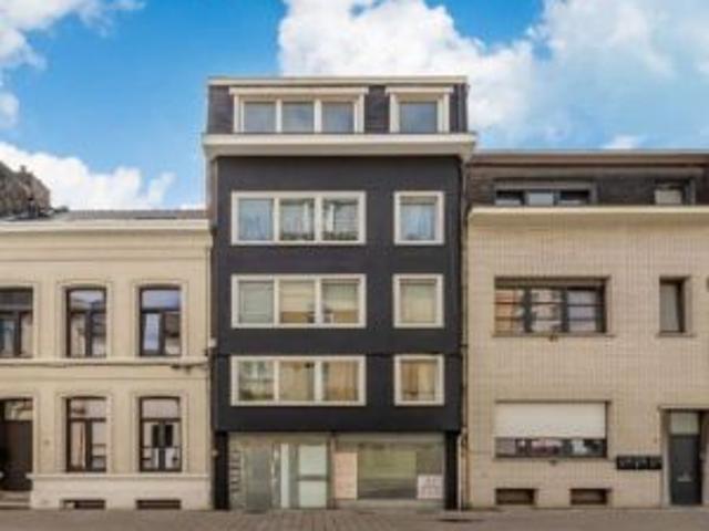 Opbrengsteigendom met handelsgelijkvloers en 5 appartementen