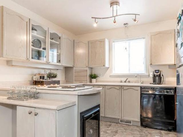 OPEN HOUSE Cozy Brick Backsplit Home on a 50 x 200 Ft Lot