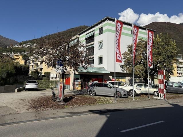 Opportunità di Investimento a Tenero Contra Stabile Residenziale con 7 Appartamenti e Locale Commerciale a Reddito