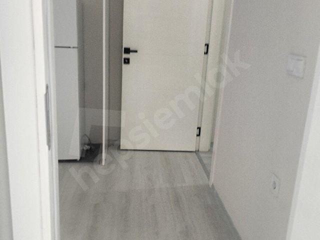 Ortaca'da havuzlu kapalı mutfak satılık 1+1 daire