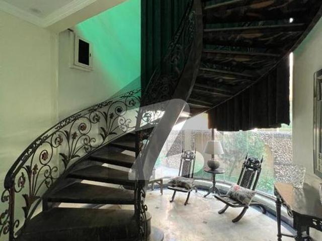 Owner build 1 kanal elegant and fully maintained super hot located bungalow is available in the best block of dha lahore. DHA Phase 4