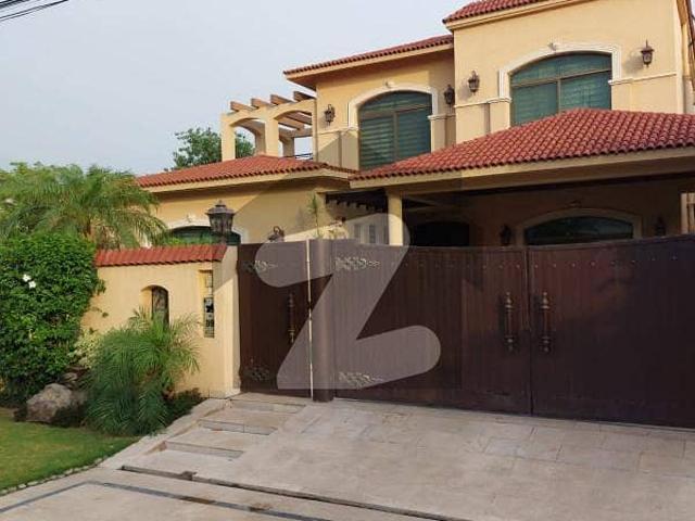 Owner build 1 kanal elegant and fully maintained super hot located spanish villa with double height lobby is available in the best block of dha lahore