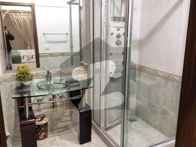 Owner build 1 kanal elegant and fully maintained super hot located spanish villa with double height lobby is available in the best block of dha lahore dha phase 4 block dd