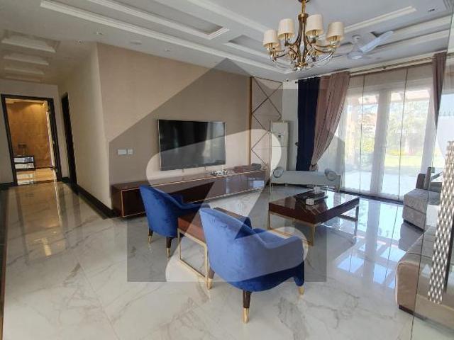 Owner build 2 kanal 1 kanal lawn+1kanal constructed fully maintained super hot located bungalow with solar system installed is available in the best block of phase 7 near raya dha lahore dha phase 7