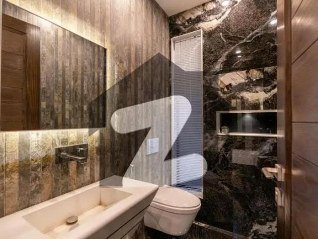 Owner needy 26 marla brand new ultra modern house with beutiful huge lawn for sale near to carrefour dha phase 7 block u