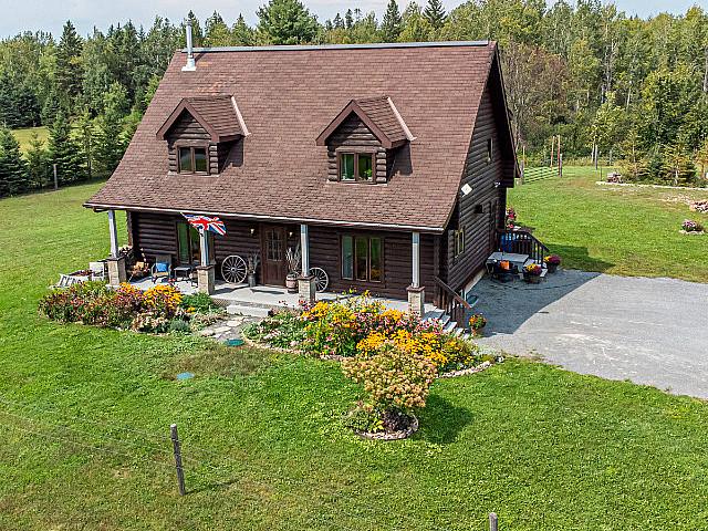 Ottawa Area 3 + 1 Bed, 2 Bath Log Home On Nearly 3 Acres