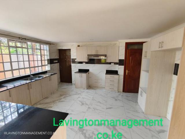 Outstanding new secure corner villa 5 bedrooms plus family rm, study and dsq