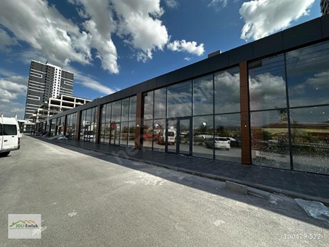 OVACIĞIN EN PRESTİJLİ SİTESİNDE CADDE CEPHE GENİŞ VİTRİN DÜKKAN