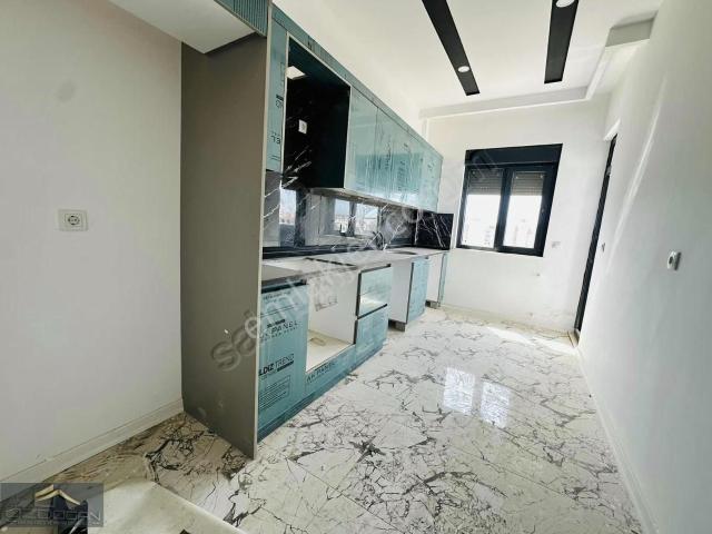 Özdoğan Emlaktan Sütçüler De 2+1 100m2 Katta Sıfır Daire