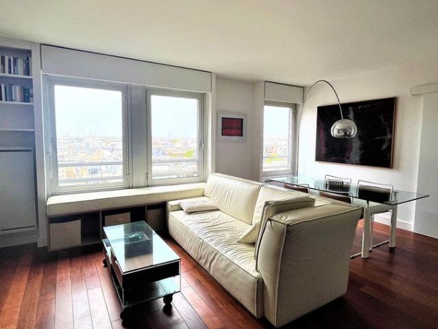 Panoramic Splendor: 13th Floor View of Sacré Coeur Basilica from a Secure Building with Concierge, Paris Amsterdam Apartments for Rent