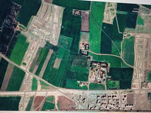 Particulier vend terrain zone immeuble