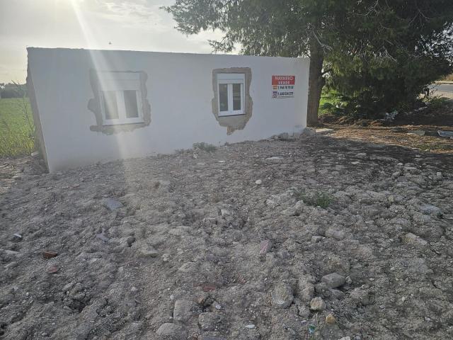Parcela con casa de apero