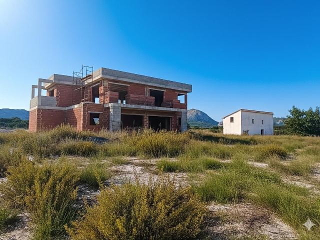 Parcela en venta en Benidoleig con dos viviendas para reformar