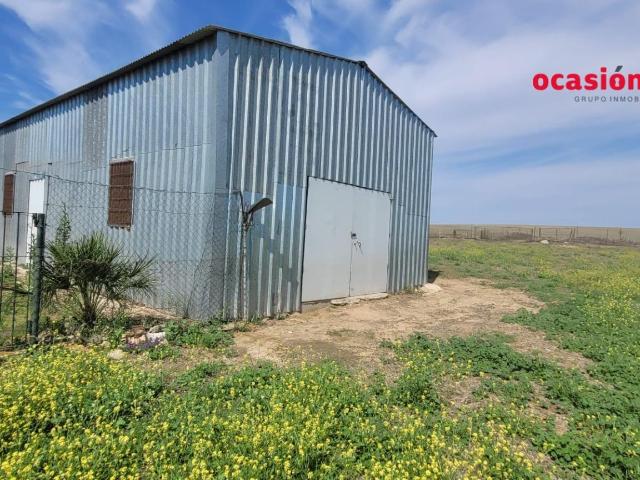 PARCELA RÚSTICA CON NAVE EN VENTA