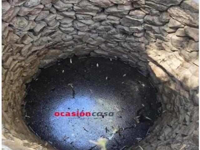 PARCELA RÚSTICA CON CASA A LA VENTA