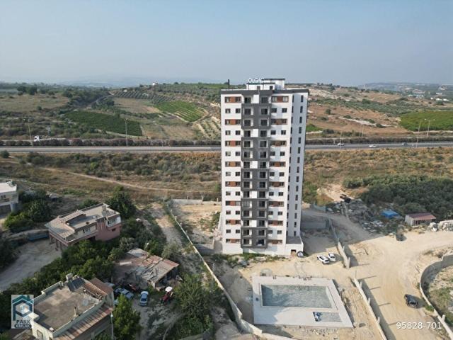 PARK EMLAKtan TARSUS ÜNİVERSİTE YOLU ÜZERİ SATILIK 2+1 HAVUZLU DAİRE
