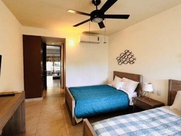 Penthouse caribeño con azotea privada en venta en Aldea Zamá