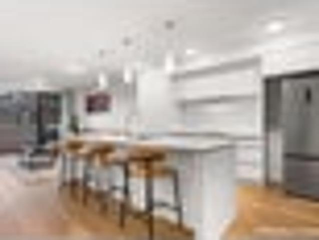 Penthouse Living with Uninterrupted Wetland Views