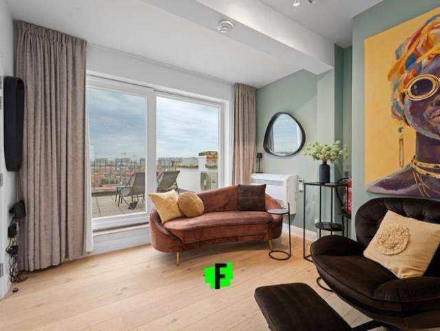 Penthouse rénové avec de belles terrasses et vues à Ostende