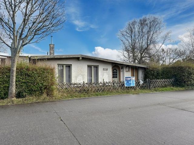 Perceel grond met af te breken woning gunstige ligging