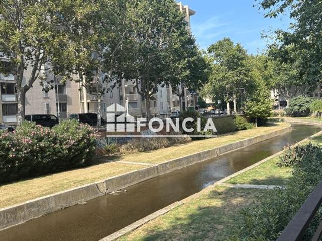 Perpignan proche place catalogne avec vue sur les quais t1 avec grand balcon