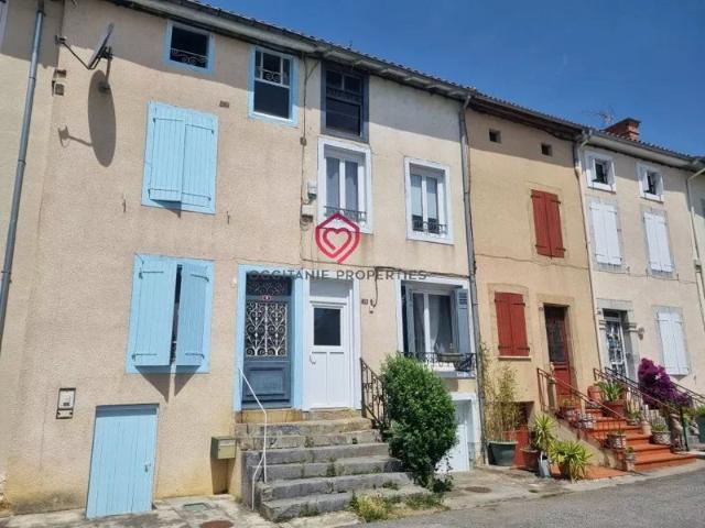 Petit maison de ville compacte joliment rénovée avec cuisine d'été