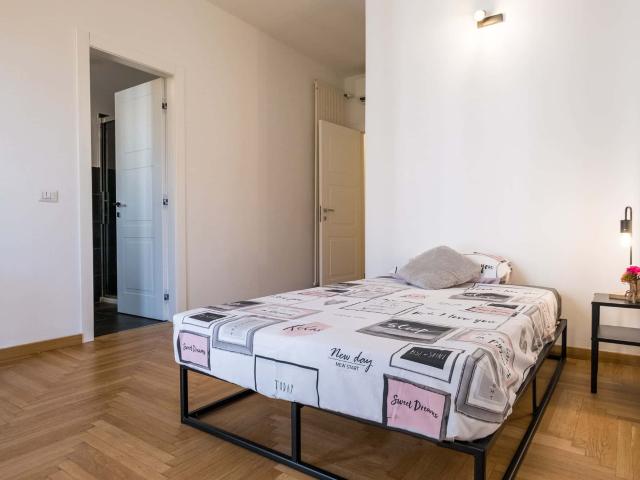 Piazza Carlo Caneva 4 Room 2