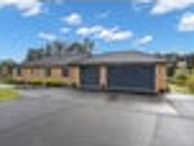 Picturesque Lifestyle Property with Land & Sheds