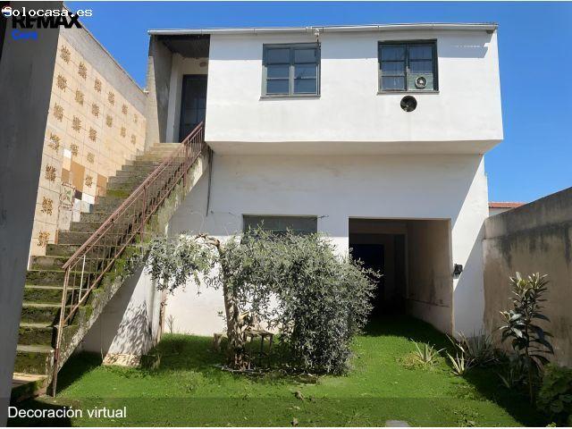Piso con Amplio Local Comercial con Porche y Patio: ¡Perfecto para Tu Negocio!