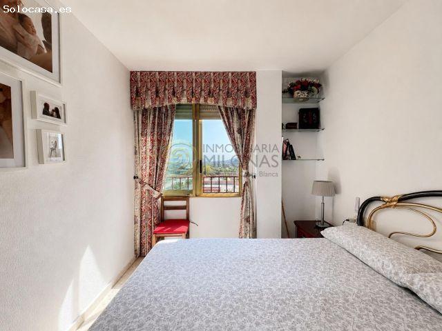 Piso de esquina de 3 dormitorios en zona centro en Benidorm con terraza acristalada y vistas despej