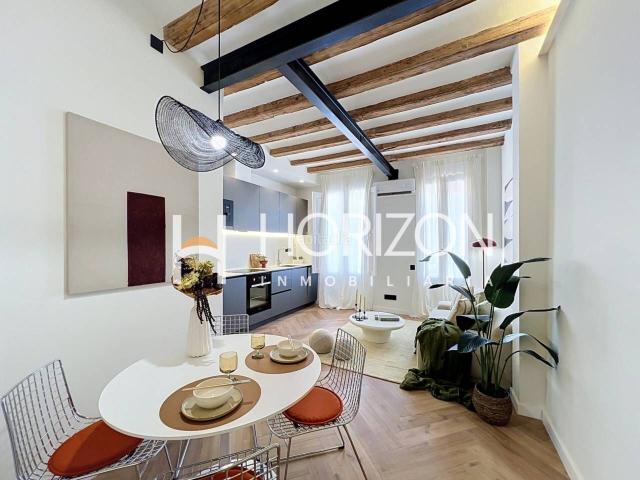 Piso en venta en Barcelona, Sant Antoni. Exclusivo piso de diseño con terraza sur y carácter histórico en la calle Parlament Sant Antoni. Pisos.