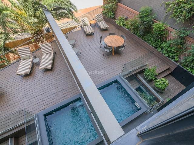 Piso en venta en Barcelona, Sant Gervasi Galvany. Espectacular planta baja dúplex de diseño con terraza y piscina en edificio emblemático en Aribau 306. Pisos.