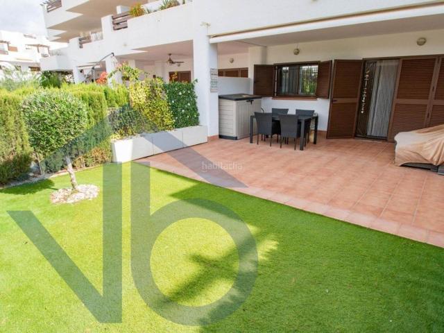 Piso en venta en San Juan de los Terreros. Moderno apartamento en planta baja con jardín privado a 300 metros del mar. Pisos San Juan de los.