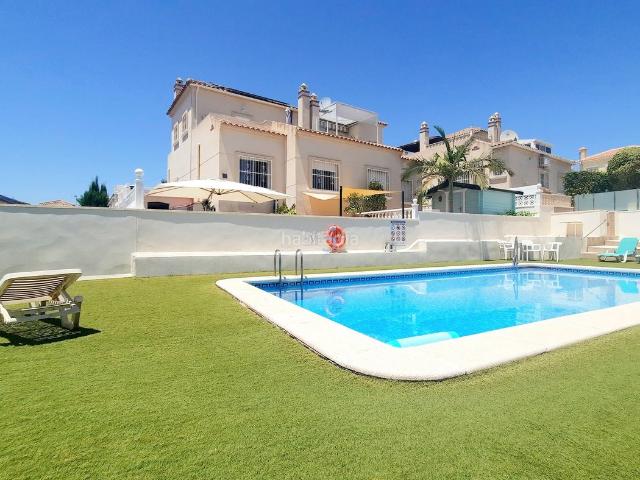 Piso en venta en San Miguel de Salinas. Apartamento elevado de 2 dormitorios y 1 baño en la planta baja en El Galán, con piscina común, jardín privado, terrazas, vistas a. Pisos San Miguel de.